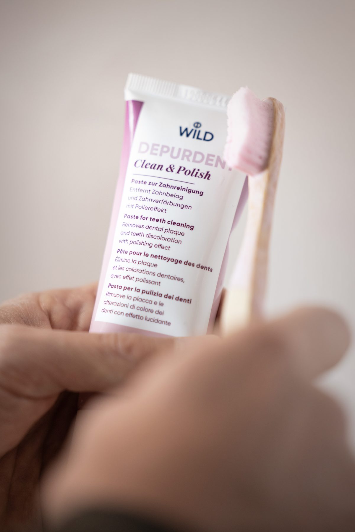 Depurdent packaging held in hand